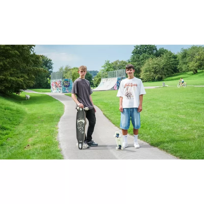 Longboard Muuwmi Lights GLOW ABEC 7 hehkuvilla pyörillä, musta/vihreä