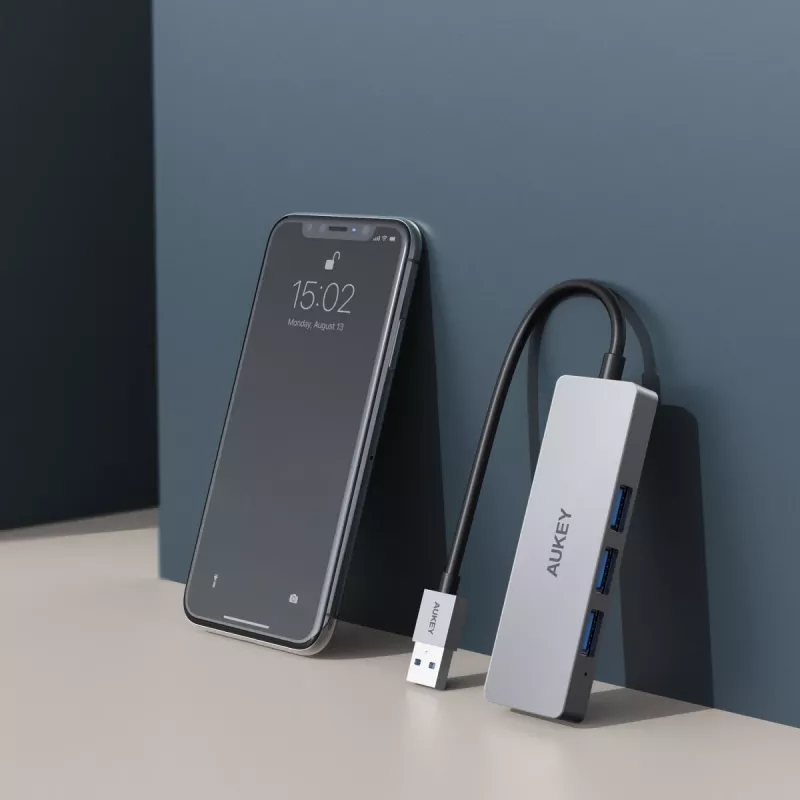 USB-keskitin Aukey CB-H36 — 4-porttinen USB 3.2 Gen 1 Type-A, isäntä USB 2.0, 5 000 Mbit/s, alumiini hopea