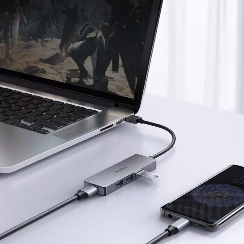 USB-keskitin Aukey CB-H36 — 4-porttinen USB 3.2 Gen 1 Type-A, isäntä USB 2.0, 5 000 Mbit/s, alumiini hopea