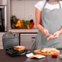 Sandwich-grilli Black & Decker BXSA753E — 2 voileipää, 750 W, tarttumattomat levyt, 215×125 mm grillipinta, kompakti ruostumaton teräs