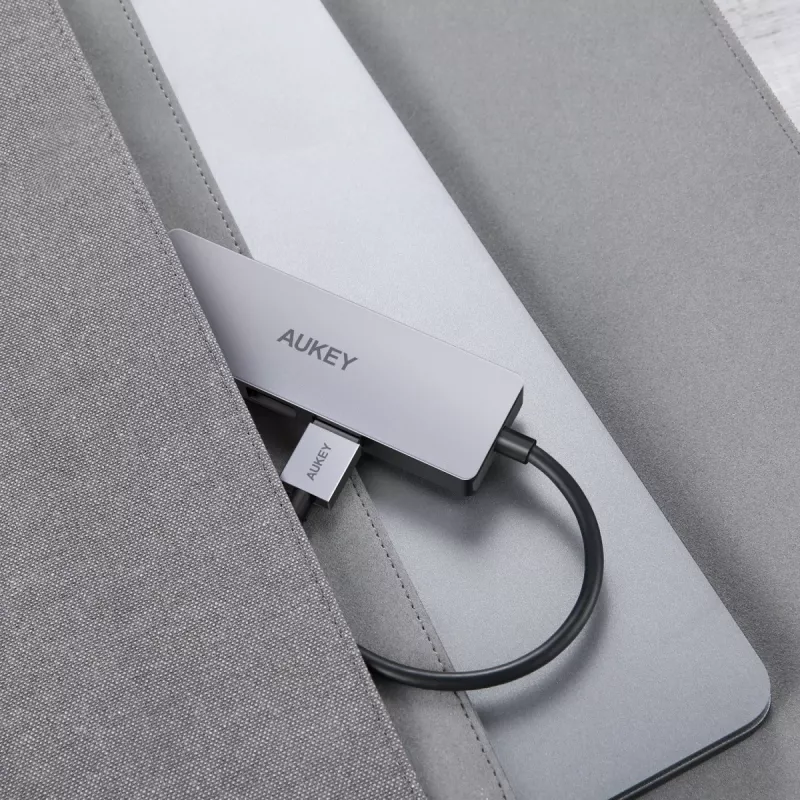 USB-keskitin Aukey CB-H36 — 4-porttinen USB 3.2 Gen 1 Type-A, isäntä USB 2.0, 5 000 Mbit/s, alumiini hopea