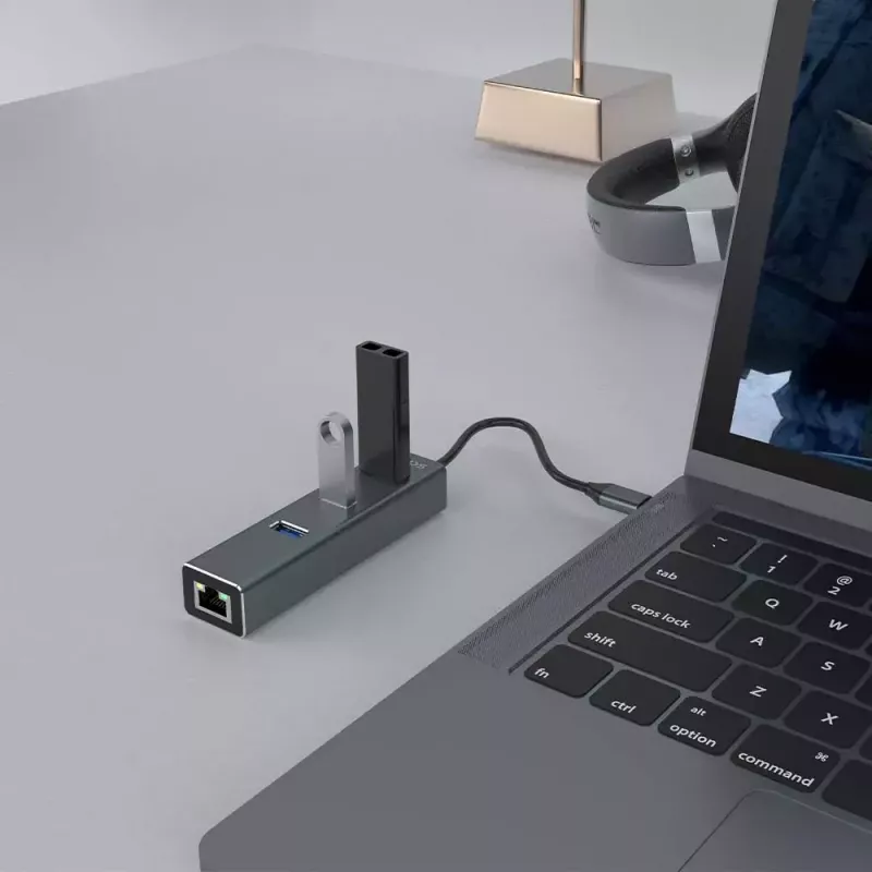 USB-C-keskitin SAVIO AK-57, jossa 3× USB-A, RJ-45 Gigabit Ethernet (5000 Mbit/s), alumiini harmaa