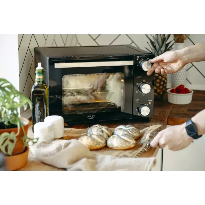 Sähköinen pöytäuuni Adler AD 6024 — kompakti, 22 l tilavuus, 1300 W, musta