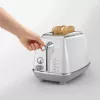 Leivänpaahdin De’Longhi CTOC2103.W 2 viipaletta 900 W valkoinen ruostumaton teräs