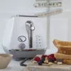 Leivänpaahdin De’Longhi CTOC2103.W 2 viipaletta 900 W valkoinen ruostumaton teräs