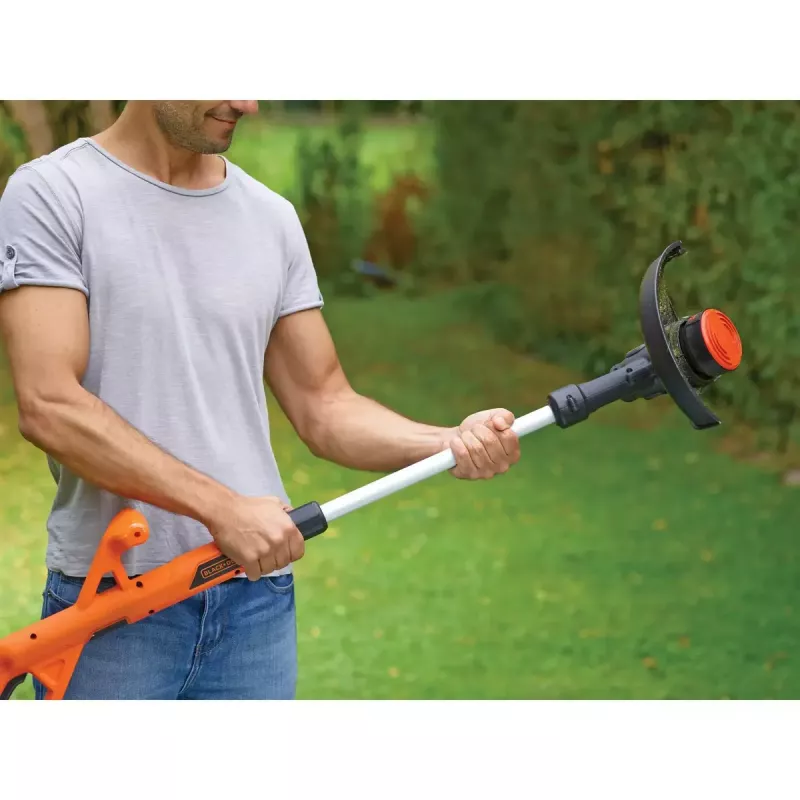 Black & Decker ST182320-QW akkukäyttöinen ruohotrimmeri, 18 V, 2,0 Ah Li-Ion, 25 cm leikkuuleveys, sis. akun ja laturin, oranssi/musta