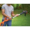 Black & Decker ST182320-QW akkukäyttöinen ruohotrimmeri, 18 V, 2,0 Ah Li-Ion, 25 cm leikkuuleveys, sis. akun ja laturin, oranssi/musta