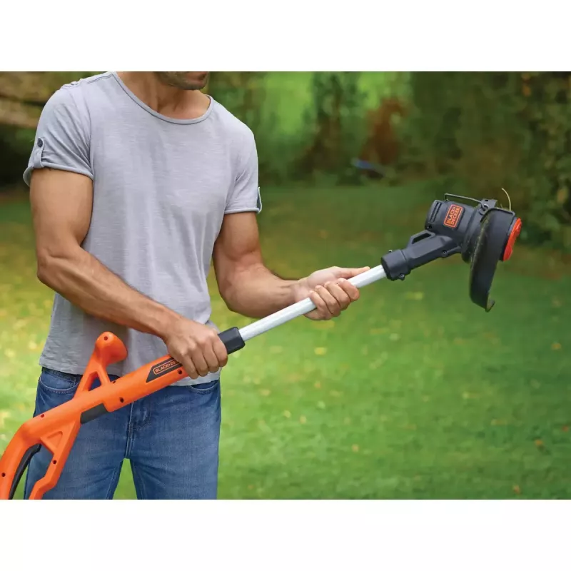 Black & Decker ST182320-QW akkukäyttöinen ruohotrimmeri, 18 V, 2,0 Ah Li-Ion, 25 cm leikkuuleveys, sis. akun ja laturin, oranssi/musta