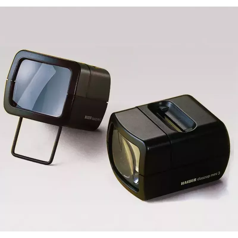 Diaprojektori KAISER 2010 — kompakti 3-kertainen suurennus, 75×105×60 mm, 1,5 V paristo
