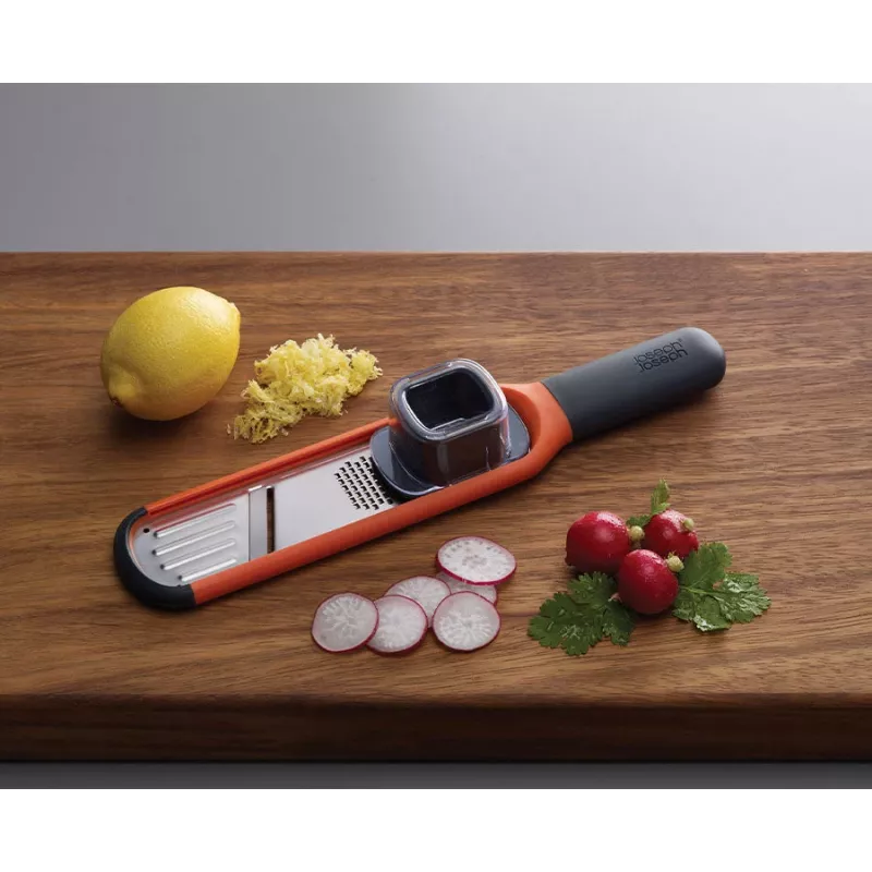 Joseph Joseph Handi-Grate 2-in-1 mini raastin & viipalointileikkuri - oranssi - ruostumaton teräs