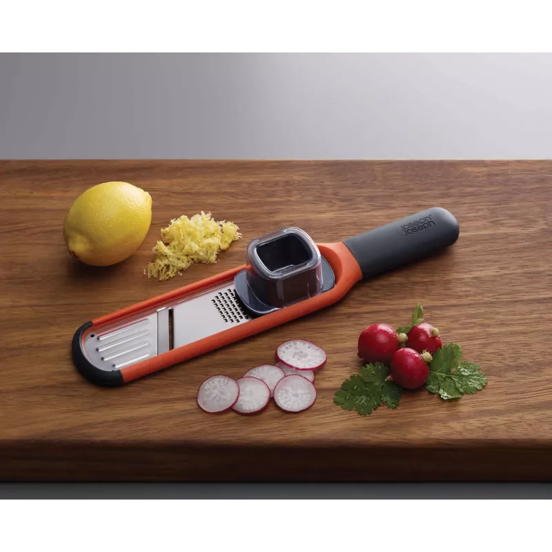 Joseph Joseph Handi-Grate 2-in-1 mini raastin & viipalointileikkuri - oranssi - ruostumaton teräs
