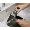 Joseph Joseph Palm Scrub Grey astianpesuharja integroidulla astianpesuaineannostelijalla
