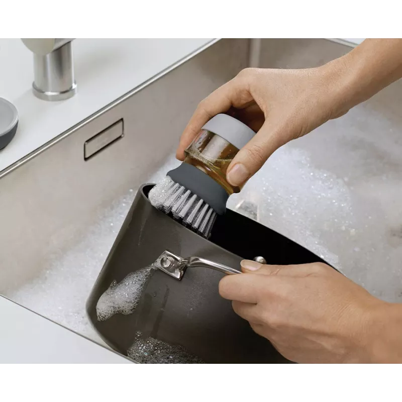Joseph Joseph Palm Scrub Grey astianpesuharja integroidulla astianpesuaineannostelijalla