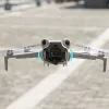 SUNNYLIFE objektiivinsuojus DJI Mini 4 Pro -droonille - häikäisynesto, objektiivinsuoja, musta