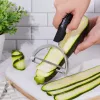 Microplane Peeler XL kuorimaveitsi kirurgisella ruostumattomalla terällä, ergonomisella Soft-Touch-kahvalla, integroidulla perunansilmäpoistajalla, musta