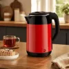 Brock WK 5522 RD sähköinen vedenkeitin 1,8L 1500W musta/punainen 360° jalustalla