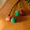 Marley Smile Jamaica langalliset in-ear-kuulokkeet mikrofonilla ja USB-C:llä, 9 mm:n elementit – Rasta (EM-JE042-RA)