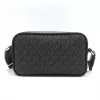 Michael Kors Jet Set crossbody-laukku Black Signature Coated Canvas 35R5S2BC0BBLA